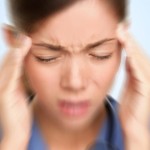 Concussion: How To Tell & What First Aid To Administer woman-migraine